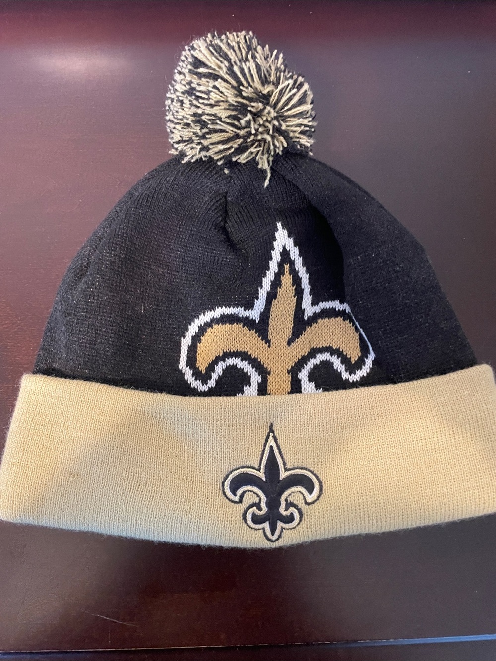 Men’s Saints Black and Gold Pom Beanie with Fleur-de-lis